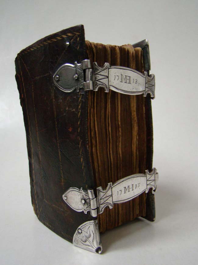 A Rare and Historic silver mounted Holy Bible and Book of Common Prayer owned by Charlestown, Mass., resident Mary Henley (White) and dated 1713.